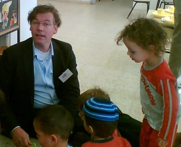 Visitors with the children of Migdal Oz